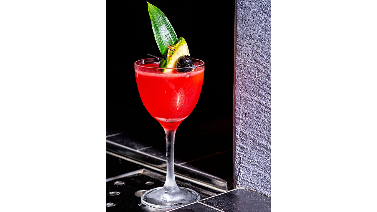 The Flower Pot Punch features rum, citrus, spiced pineapple syrup and grenadine.