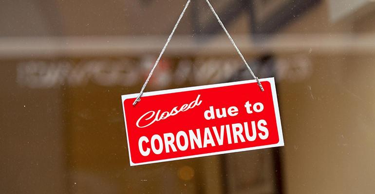 Sign reading "closed due to coronavirus"