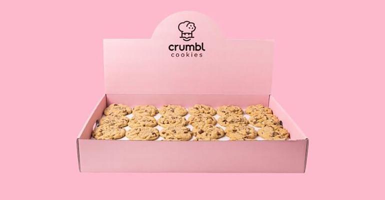 Pink box of Crumbl cookies