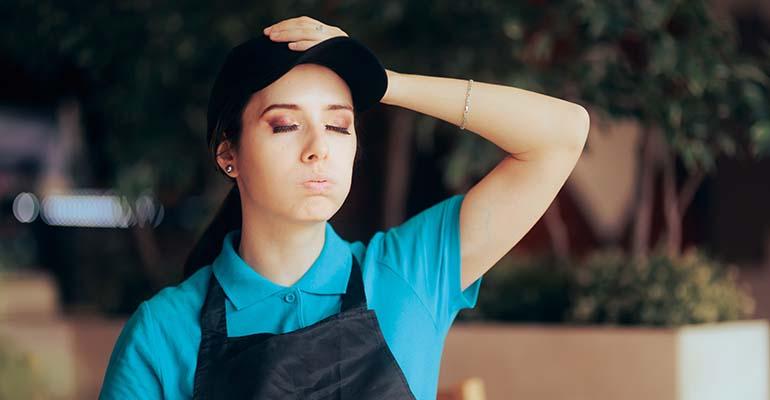 Fast-Food Worker Feeling Stressed and Overwhelmed.jpg