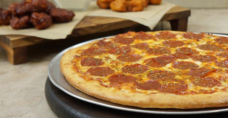 A pizza and wings combo from Pasqually's