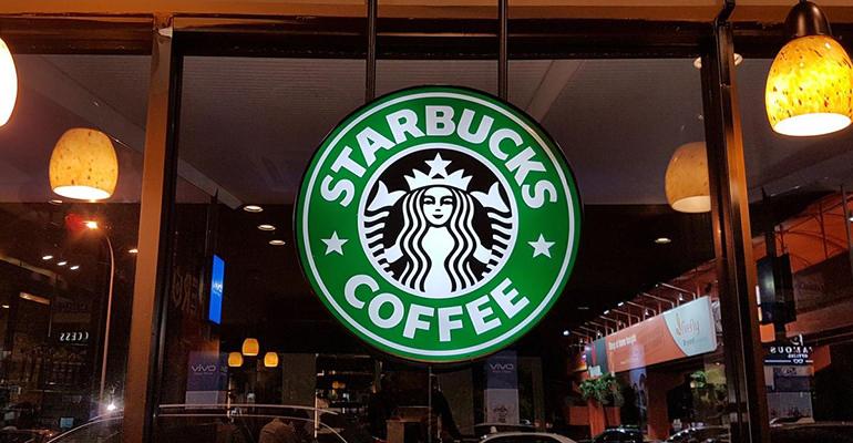 Starbucks storefront with sign