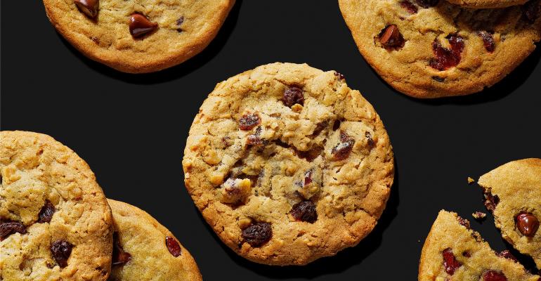 Chocolate chip cookies on a black background