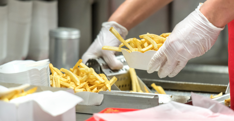 fast-food-restaurant-worker-getty-promo.png