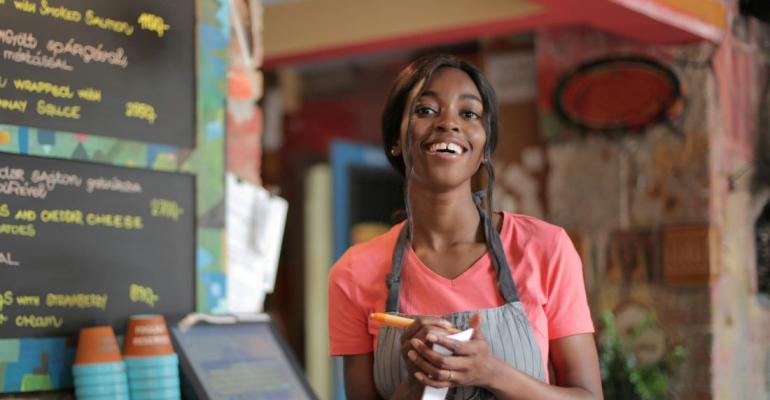 Smiling restaurant worker