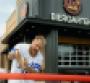 Jake Paul cutting the ribbon for Dog Haus opening