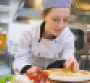 Female chef making a pizza