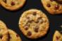 Chocolate chip cookies on a black background