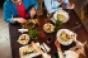 Young people eating lunch at restaurant.jpg