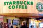 Starbucks scales back new stores, expects new drinks to perk up traffic