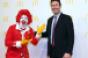 Steve Easterbrook CEO McDonald poses with Ronald McDonald during the new McDonald39s Flagship Restaurant reopening at Frankfurt International Airport